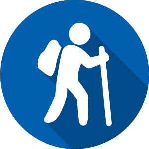 Icon of a hiker, white on a blue circle
